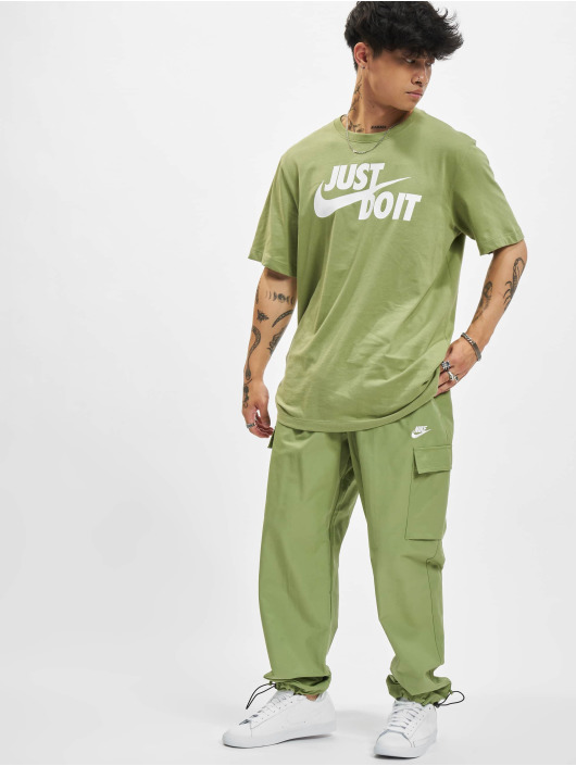 Nike Verryttelyhousut NSW Repeat Sw Wvn vihreä