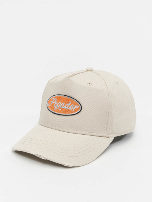 PEGADOR Gorra Snapback West Destroyed beis