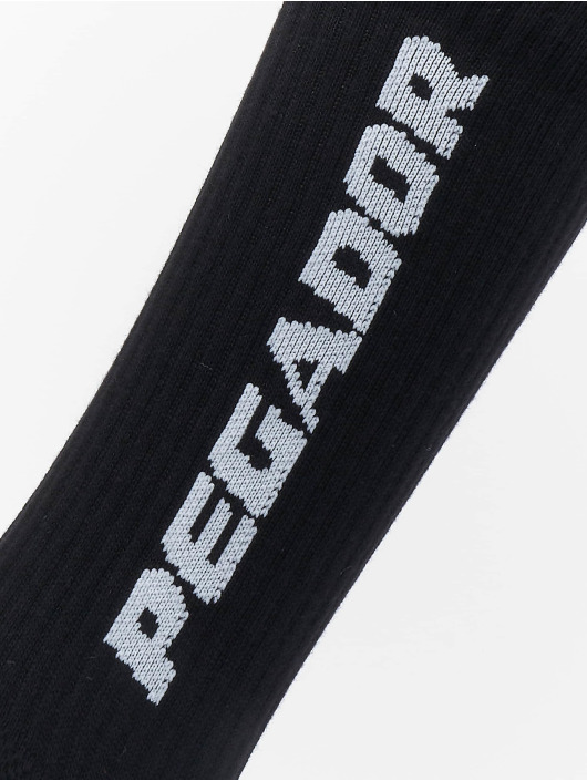PEGADOR Sukat Cross Logo musta