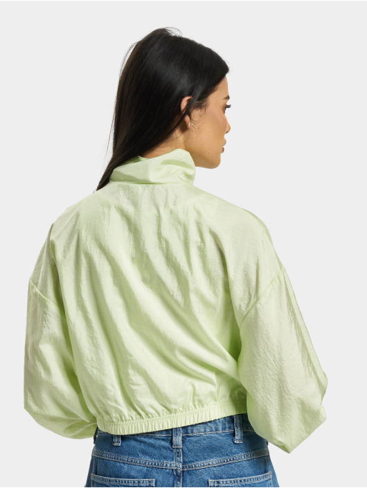 Puma Chaqueta de entretiempo Dare To Woven Cropped verde