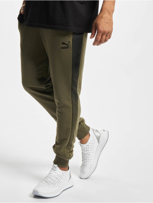 Puma Spodnie do joggingu Between The Lines T7 oliwkowy