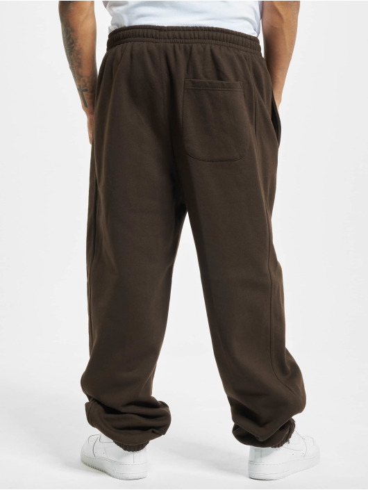 Pantalon de survêtement coupe tapered avec poches latérales De Bijenkorf Vêtements Pantalons & Jeans Pantalons Joggings 