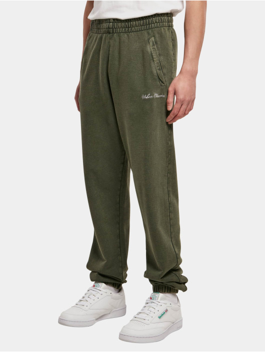Urban Classics Spodnie do joggingu Small Embroidery zielony