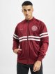 UNFAIR ATHLETICS Veste mi-saison légère DMWU Tracktop rouge