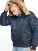Urban Classics Bomberová bunda Hooded Heavy Fake Fur modrá