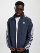 adidas Originals Chaqueta de entretiempo Lock Up azul