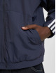 adidas Originals Chaqueta de entretiempo Lock Up azul