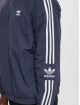 adidas Originals Chaqueta de entretiempo Lock Up azul