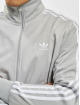 adidas Originals Chaqueta de entretiempo Fbird gris