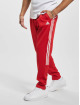 adidas Originals Jogging kalhoty Originals červený