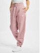 adidas Originals Pantalone ginnico adicolor Essentials Fleece rosa chiaro