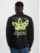 adidas Originals Pilottitakit Behind musta