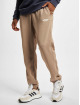 adidas Originals Spodnie do joggingu Essentials brazowy