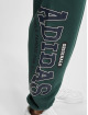 adidas Originals Spodnie do joggingu Varsity zielony