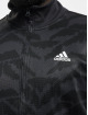 adidas Originals Välikausitakit Tiro harmaa