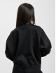 adidas Originals Välikausitakit Tiro Suit Up Advanced musta