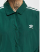adidas Originals Välikausitakit Coach vihreä