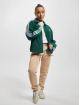adidas Originals Välikausitakit Coach vihreä