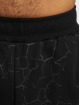 Dangerous DNGRS Spodnie do joggingu Cracks Oversized czarny