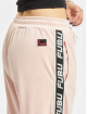 Fubu Jogging kalhoty Corporate Tape Velours růžový