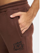 Fubu Spodnie do joggingu Script Essential brazowy