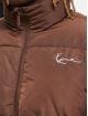 Karl Kani Gewatteerde jassen Chest Signature bruin