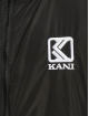 Karl Kani Gewatteerde jassen Retro Reversible Tie Dye zwart