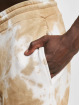 Karl Kani Jogging Signature Tie Dye blanc