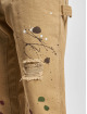 Karl Kani Straight fit jeans Paintsplatter beige