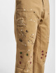 Karl Kani Straight fit jeans Paintsplatter beige