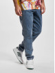 Karl Kani Väljät farkut Small Signature Tape Five Pocket Denim Loose Fit indigonsininen