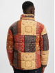 Karl Kani Winterjacke Retro Paisley Reversible Corduroy bunt
