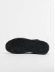 Lacoste Sneakers T-Clip Mid SMA grå