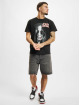 Merchcode t-shirt Ozzy Osbourne Face Of Madness zwart
