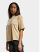 New Balance Camiseta Athletics 70s Run Graphic beis