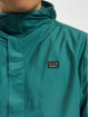 New Balance Chaqueta de entretiempo At Woven beis