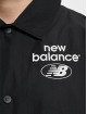New Balance Chaqueta de entretiempo Essentials negro