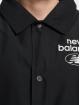 New Balance Chaqueta de entretiempo Essentials negro