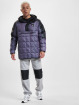 New Balance Chaqueta de entretiempo All Terrain Iridescent púrpura