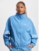 New Balance Giacca Mezza Stagione Athletics Woven blu