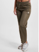 New Balance Jogging kalhoty Uni-Ssentials olivový