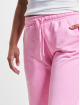 New Balance Jogging kalhoty Essentials růžový