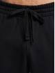 New Balance Jogging kalhoty Essentials čern