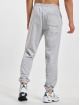New Balance Jogging kalhoty Essentials Celebrate New šedá