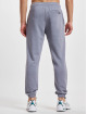 New Balance Jogging kalhoty Essentials Fleece šedá