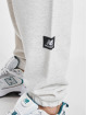 New Balance joggingbroek Athletics Warped Classics beige