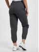 New Balance joggingbroek Athletics Fleece beige