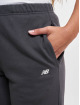 New Balance joggingbroek Athletics Fleece beige