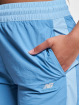 New Balance joggingbroek Athletics Woven blauw