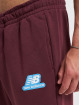 New Balance joggingbroek Essentials Stacked Rubber Pack rood